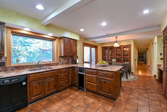 kitchen with sink, hanging light fixtures, dishwasher, kitchen peninsula, and beamed ceiling