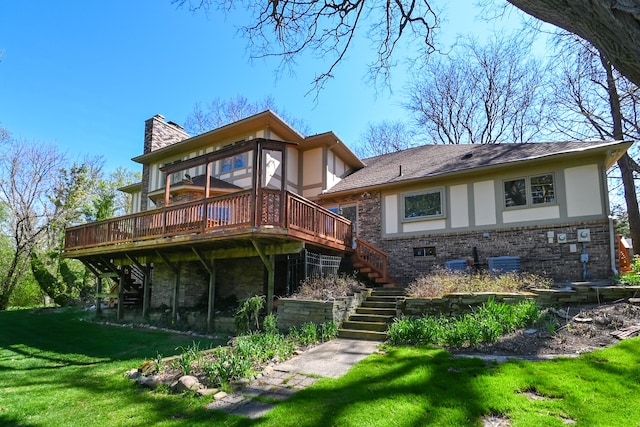 rear view of property with a deck, a chimney, and stairs