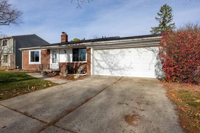 single story home with a garage