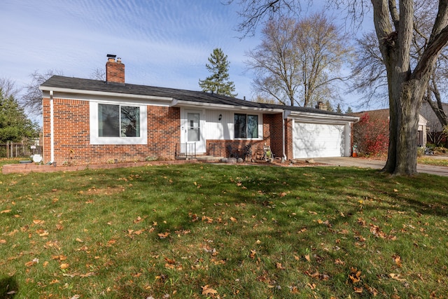 ranch-style home with a garage and a front lawn