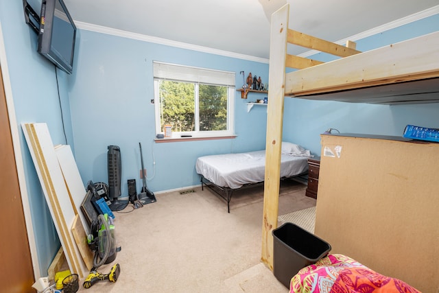 bedroom featuring carpet flooring and ornamental molding