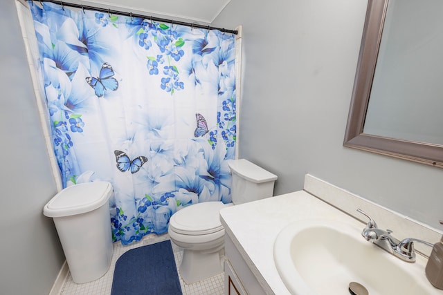 bathroom with tile patterned flooring, vanity, toilet, and a shower with shower curtain