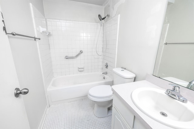 full bathroom with tile patterned floors, vanity, toilet, and tiled shower / bath