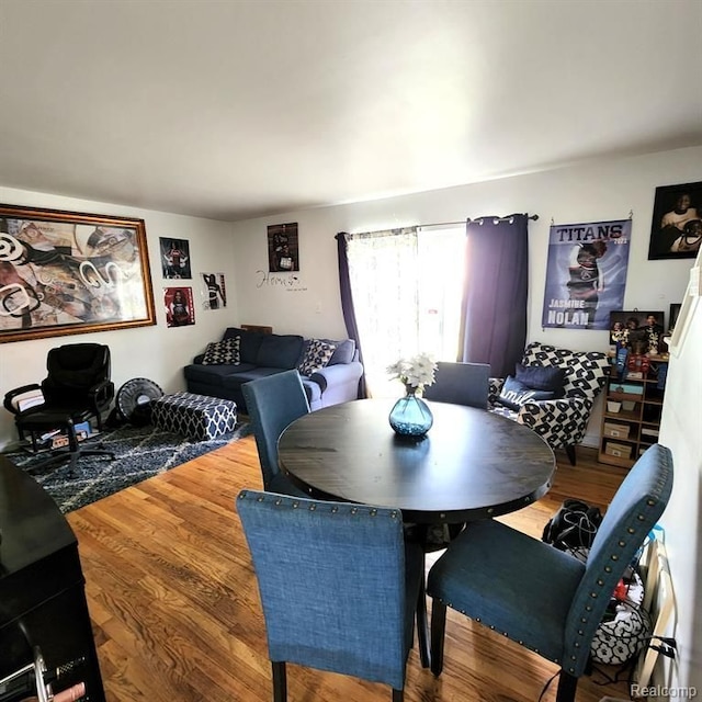 dining room featuring hardwood / wood-style flooring