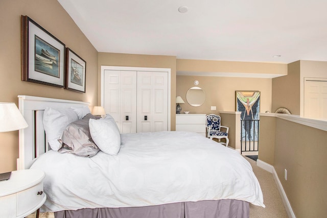 carpeted bedroom featuring a closet