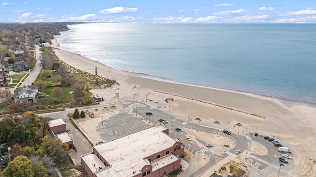 bird's eye view with a beach view and a water view