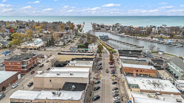 drone / aerial view with a water view