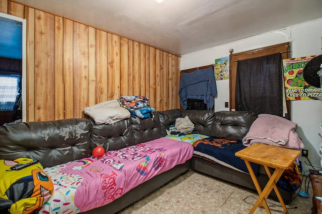 living room with wooden walls