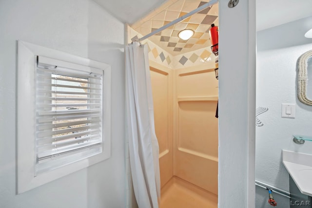 bathroom with curtained shower