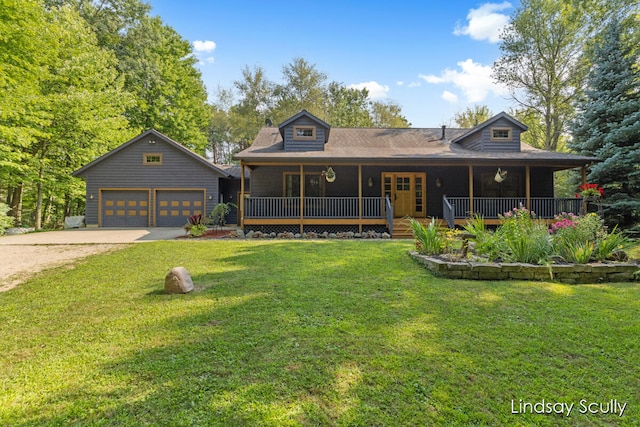 view of front facade with a front lawn, covered porch, an outdoor structure, and a garage