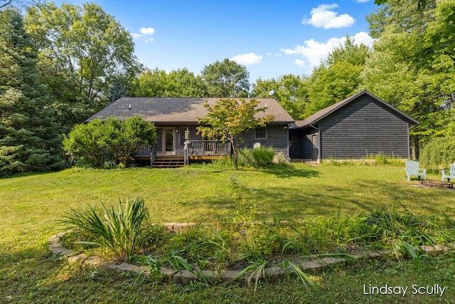 exterior space with a front yard and a deck