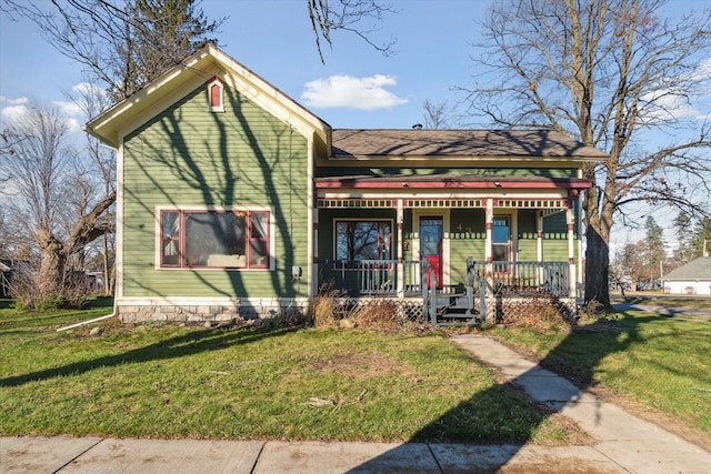 view of front of home featuring a porch and a front lawn