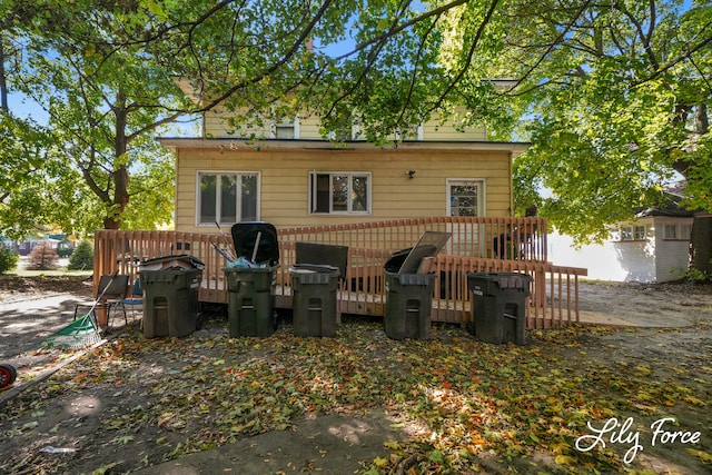 rear view of house with a deck