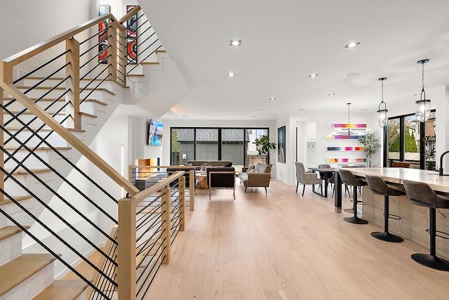 stairway featuring hardwood / wood-style flooring