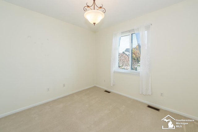 view of carpeted spare room