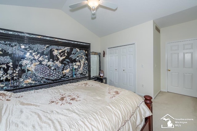 carpeted bedroom featuring lofted ceiling, a closet, and ceiling fan