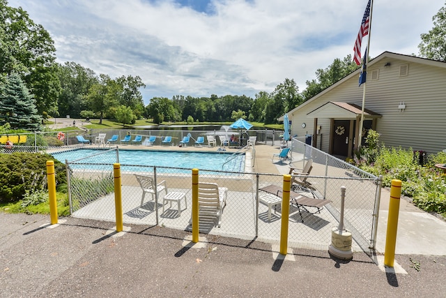 view of swimming pool featuring a patio