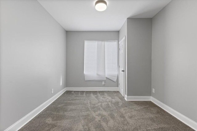 empty room featuring carpet flooring