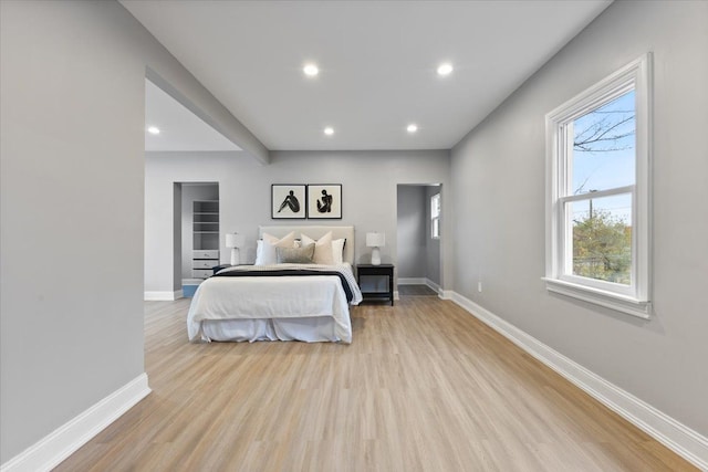 bedroom featuring light wood-type flooring