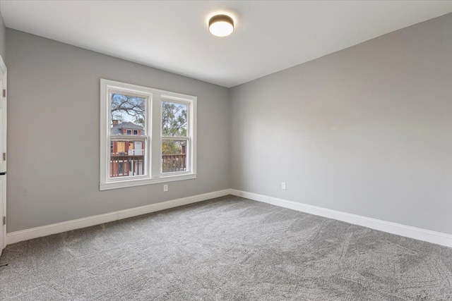 spare room featuring carpet