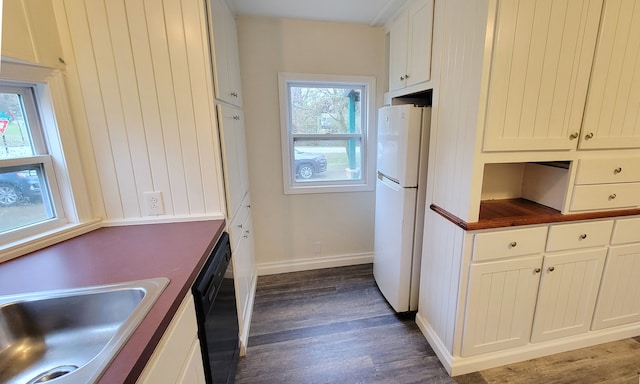 kitchen featuring dishwasher, white cabinets, white refrigerator, sink, and dark hardwood / wood-style flooring