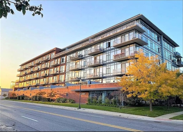 view of outdoor building at dusk