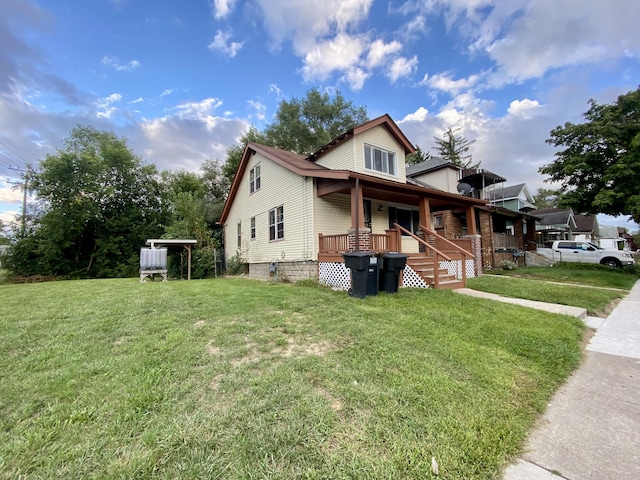 view of front of property featuring a porch and a front yard