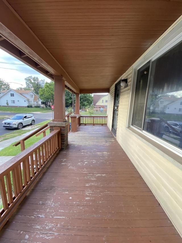 wooden terrace with covered porch