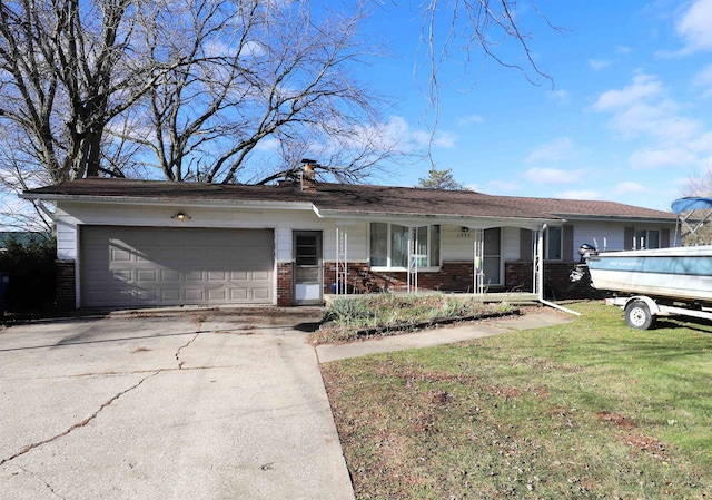 single story home featuring a front yard and a garage