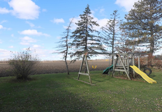 view of play area featuring a lawn