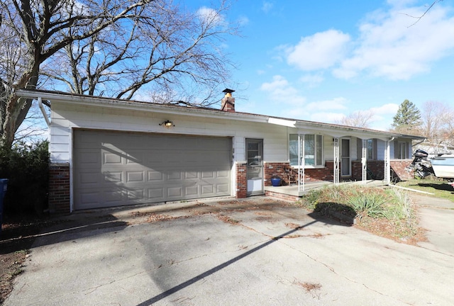 single story home featuring a garage