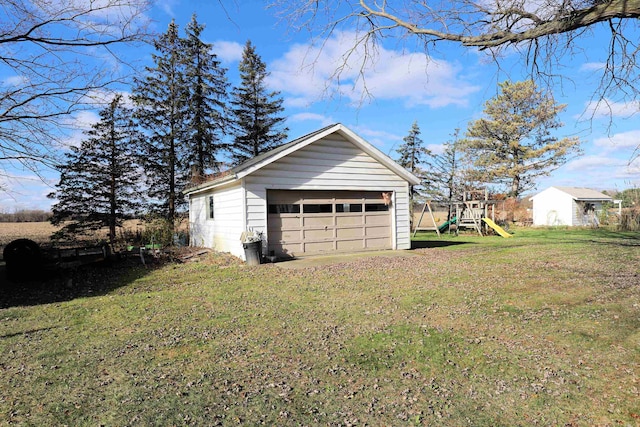 garage with a yard