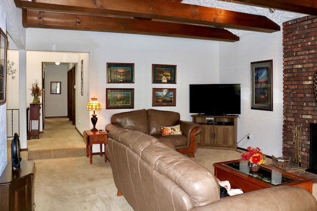 carpeted living room featuring beam ceiling and a brick fireplace