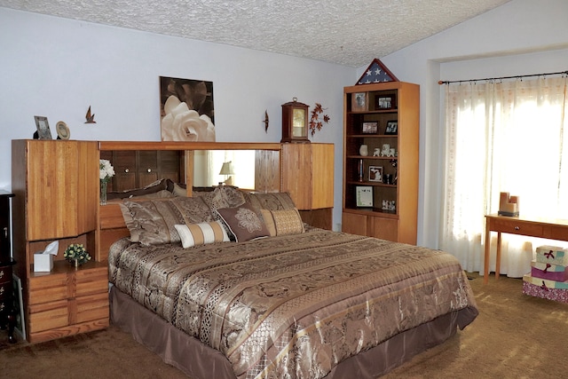 carpeted bedroom featuring a textured ceiling and vaulted ceiling