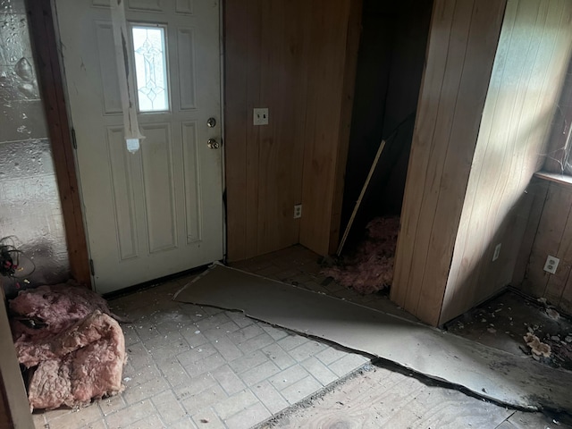 entrance foyer with wood walls