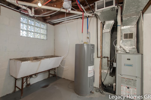 utility room featuring electric water heater