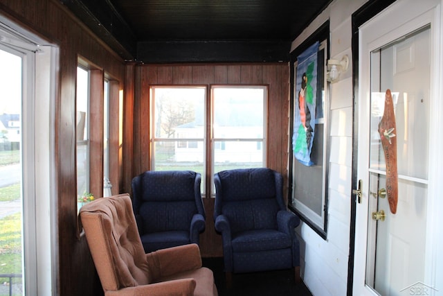 sitting room with wooden walls