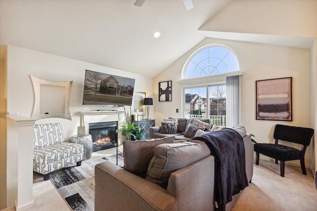 living room with light colored carpet and vaulted ceiling