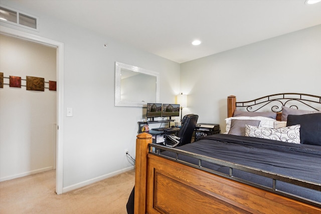 bedroom featuring light colored carpet