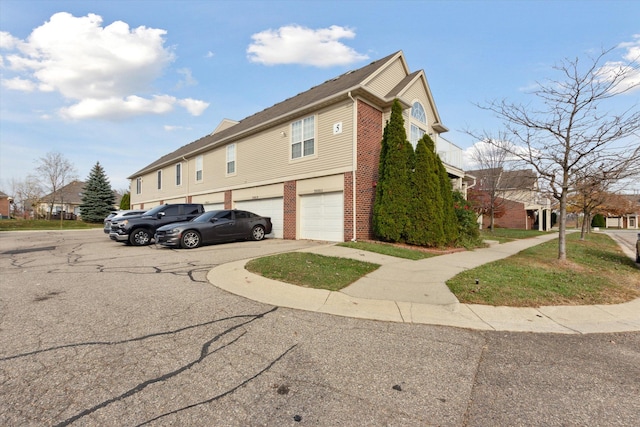 view of property exterior featuring a garage