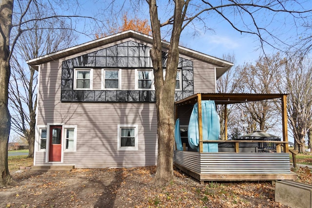 view of front of house with a wooden deck