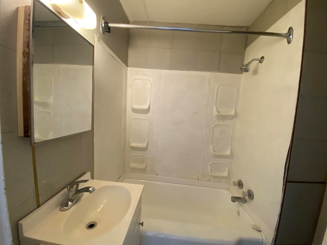 bathroom with shower / tub combination and vanity