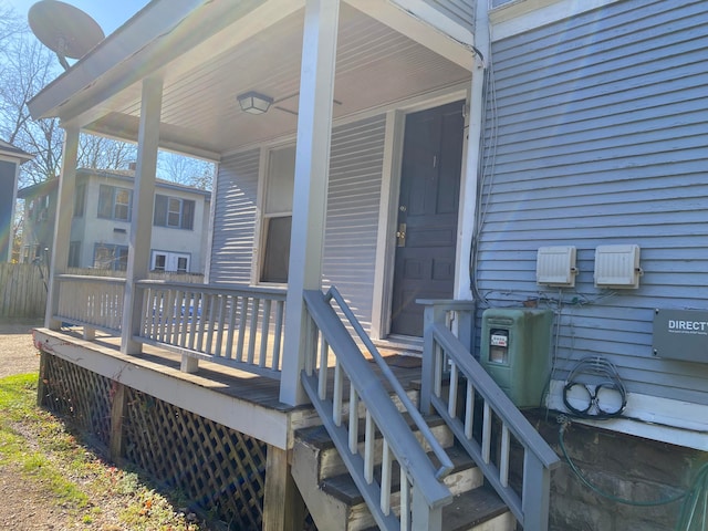 doorway to property with covered porch