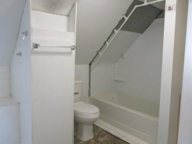 bathroom featuring tile patterned flooring and toilet