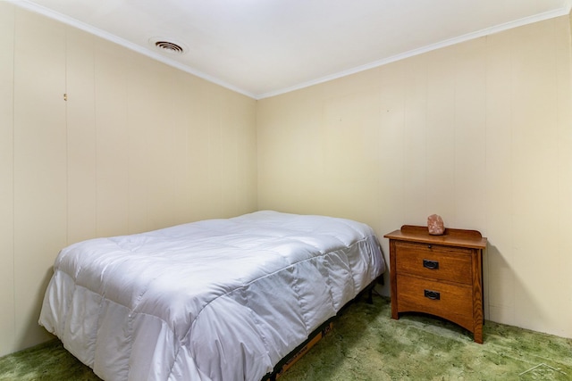 bedroom featuring carpet flooring and ornamental molding