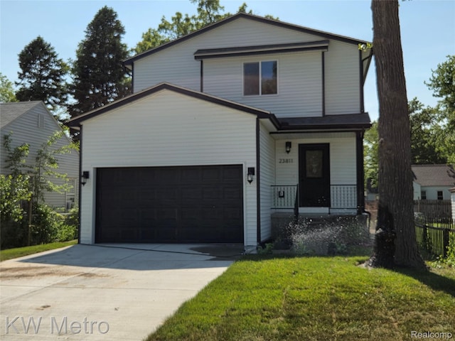23811 Vassar Ave, Hazel Park, MI 48030 - view of front facade featuring driveway, a porch, and a garage