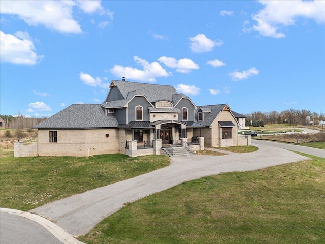 view of front of property with a front lawn