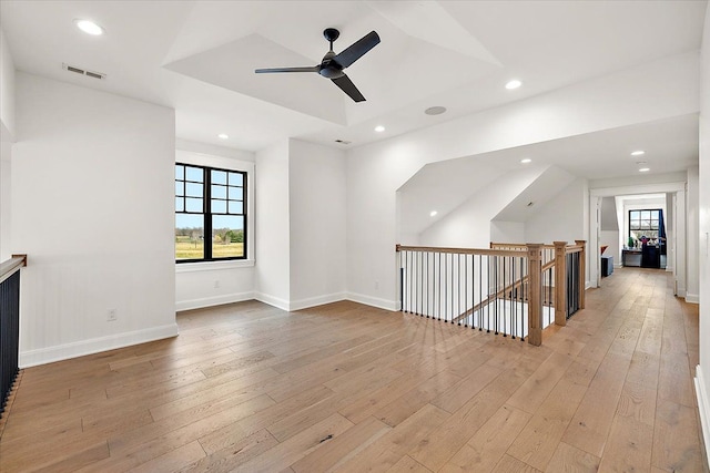 interior space featuring ceiling fan, plenty of natural light, and light wood-type flooring