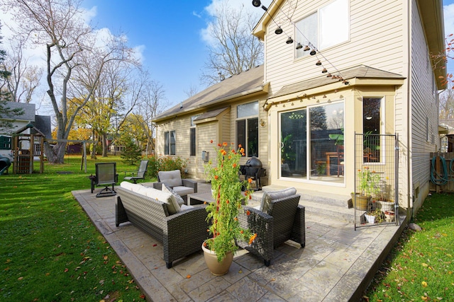 view of patio featuring an outdoor living space and a playground