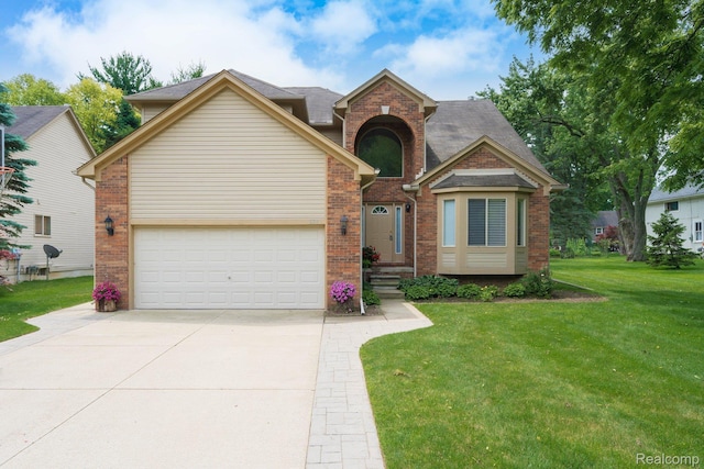 230 E Elizabeth St, Lake Orion, MI 48362 - traditional-style house featuring brick siding, a front lawn, driveway, and a garage